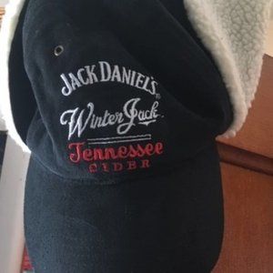 A warm ear flap hat Jack Daniels